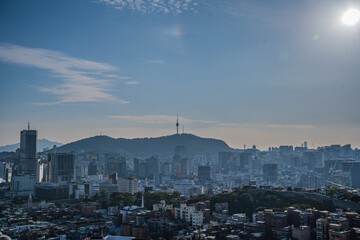 Seoul's Namsan Tower and its surrounding cityscape during the autumn day