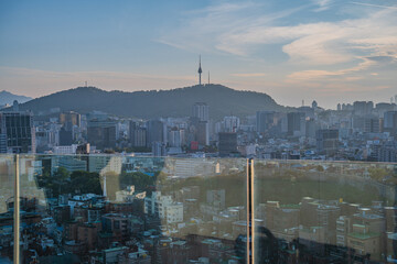 Seoul's Namsan Tower and its surrounding cityscape during the autumn day