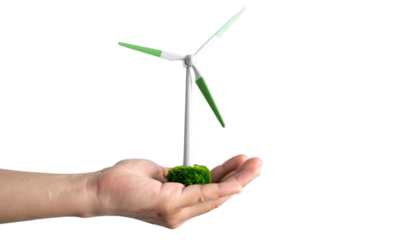 A hand presenting a miniature wind turbine. It represents renewable energy and sustainable development. 