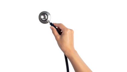 A close-up of a hand holding a stethoscope, an essential medical tool