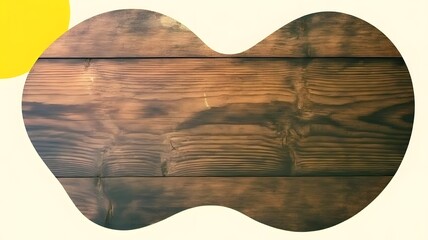 A wooden plank with a unique shape and a yellow circle