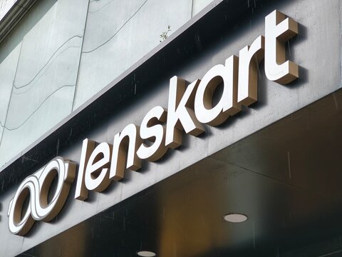Lenskart brand signage captured amid discussions on IPO, investors like Radhakishan Damani, Peyush Bansal, Dmart influence, profit, loss, valuation, and stock market listing in India&rsquo;s retail sector.