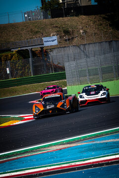 Group of GT cars in acrion on racing asphalt motorsport racetrack
