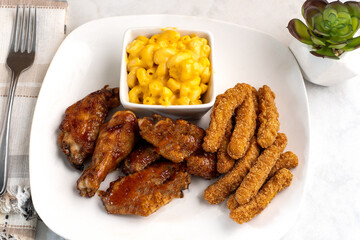 chicken wings and drumsticks with chicken fries
