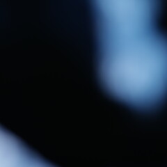 Una toma de cerca de un fondo abstracto de color azul  con negro con un degradado ligero desenfocado