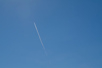 airplane in the blue sky, a sense of nostalgia and wonderlast