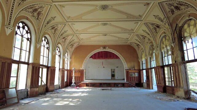 The interior of the concert hall in the abandoned sanatorium Meshakhte, Tskaltubo spa resort, Georgia