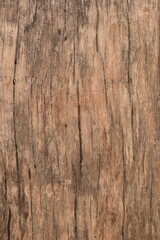 Textura de madeira velha e rachada em tons de marrom e laranja