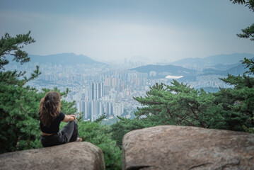 Misty Morning Over Korean Buildings
