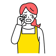 泣くエプロン姿の女性