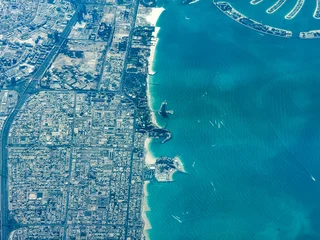 Fototapete Palme Aerial landscape view of the coastline in Dubai (Persian Gulf) around Burj Al Arab Beach- United Arab Emirates - with districts, main streets, impressive buildings and infrastructure  © Mario Hagen