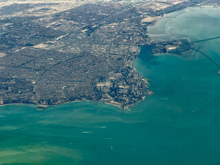 aerial landscape view of coastline around Kuwait City with skyline and skyscraper, with Green Island, Kuwait Free Trade Zone and entrance to Sheikh Jaber Al-Ahmad Al-Sabah Causeway