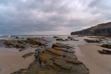 Beach of the Cathedrals view at sunset. Seascape. Lugo. Galicia. Spain