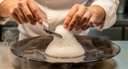 Chef hands shaping white food on a plate with