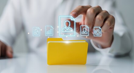Person organizing digital files and documents in yellow folder with icons