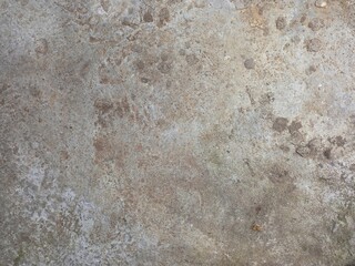 Grungy and stained concrete floor surface texture background