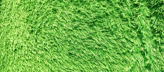 Vibrant bright green shaggy soft texture seamless background