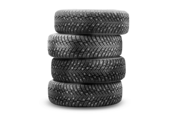 Winter tires stacked for sale, ideal for winter car maintenance and tire replacement needs in a tire shop or for personal use