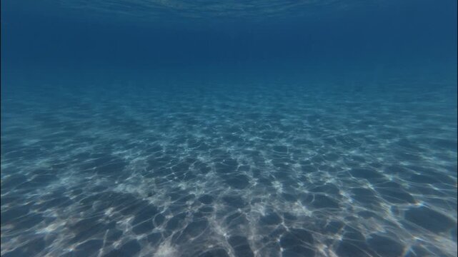 Diving Under Ocean caustics sunlight diving