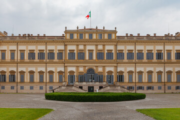 Monza, Italy - May 29, 2024: Royal Palace (Villa Reale), 18th century, facade under a cloudy sky in a spring afternoon