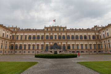 Monza, Italy - May 29, 2024: Royal Palace (Villa Reale), 18th century, facade under a cloudy sky in a spring afternoon