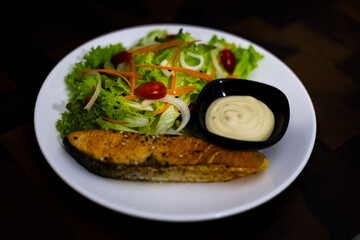 Salmon Salad On A Wooden Table
