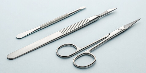 Sterile scalpel forceps sterile instrument stainless steel surgical tools arranged neatly on pale background conveying clinical precision and calm