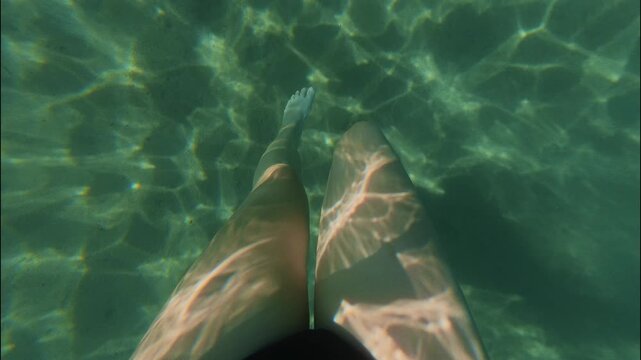 Diving Under Ocean caustics sunlight diving