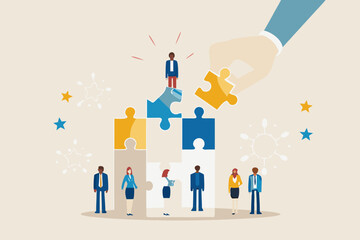 Teamwork and collaboration building success with puzzle pieces and diverse business people