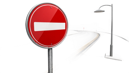 A no entry sign standing on a road with street lights and other signs in the background on black