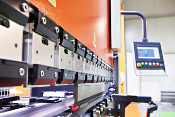 Metal sheet bending industrial machine