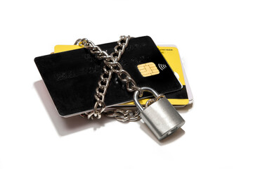 Credit cards chained with a lock. The concept of blocked bank accounts, bankruptcy, transaction...