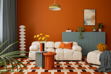 Contemporary colorful interior with modular sofa, warm orange tones, patterned rug, and minimalist furniture.