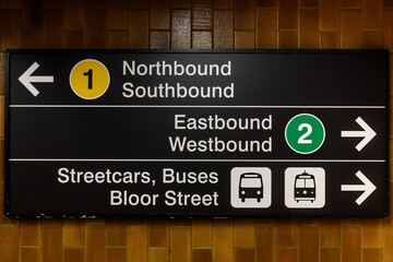 Directional signs in the Toronto, Ontario rapid transit subway system.