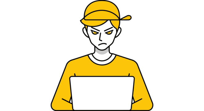 Frustrated young man wearing a yellow cap working on a laptop with an angry expression
