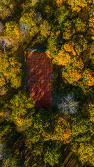 Drone View of Tennis Court in Vibrant Autumn Forest, Turku Finland