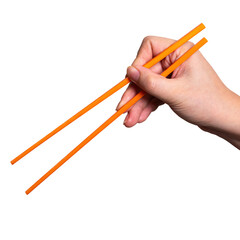 Female hand holding a orange plastic chopstick isolated on white background.