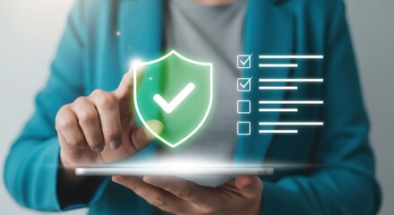 Person using digital tablet with security shield and checklist for data safety