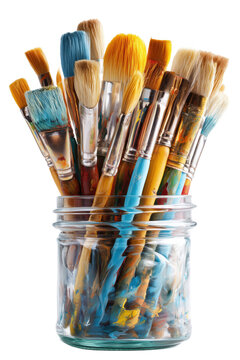 Colorful paintbrushes in a jar isolated