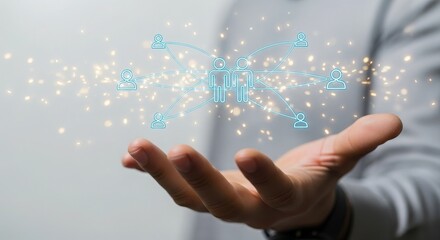 Persons hand holding a digital network structure with glowing particles around it