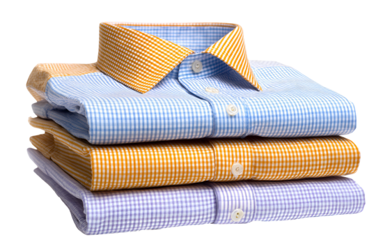 Stack of neatly folded men s dress shirts with patterned collars and cuffs