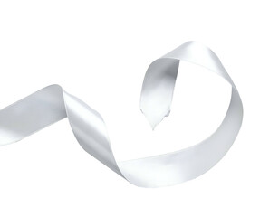 A smooth, white satin ribbon swirls against a stark black background, floating