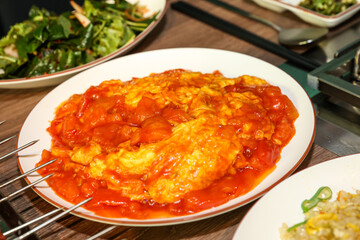 Chinese food. Tomato and egg stir fry