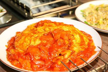 Chinese food. Tomato and egg stir fry