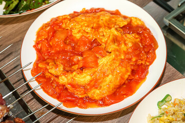 Chinese food. Tomato and egg stir fry