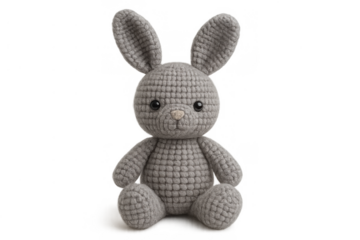 Cute gray handmade crochet rabbit amigurumi sitting, showing traditional yarn craft and softness. Transparent background