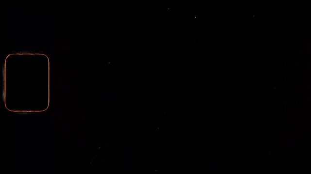 A vintage Super 8mm film matte overlay with a sprocket hole, dirt, hair, scratches, light leaks and grain in a seamless loop. 4k mov