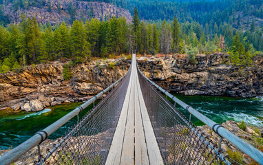 Scenic View of Kootenai Falls Suspension Bridge © PhotoSpirit