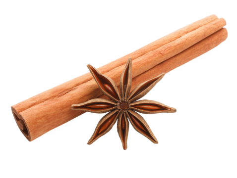 Close-up of cinnamon sticks and star anise on transparent background