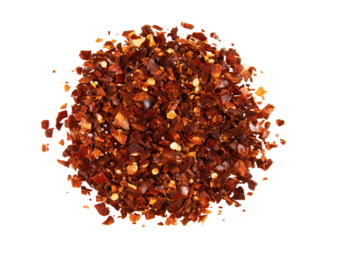 Close-up of red pepper flakes on transparent background
